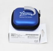 A boxed as new Starkey Summit BTE Power Plus 13 Hearing Aid in Sterling (REF: 64519-811).