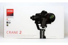 A boxed as new Zhiyun-Tech Crane 2 3-Axis Stabilizer with Follow Focus (Box sealed).