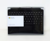 A boxed as new Type Cover for Microsoft Surface Go in black (model: 1840).