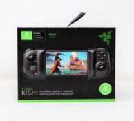A boxed as new Razer Kishi gaming controller for android devices in black.
