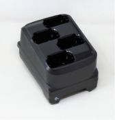 A boxed as new Zebra MC3300 4-Slot Battery Charger (P/N: SAC-MC33-4SCHG-01).