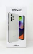A boxed as new Samsung Galaxy A52 SM-A525F/DS 128GB in Awesome White (Box sealed).