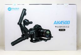 A boxed as new Feiyutech AK4500 3-Axis Handheld Gimbal Stabilizer Standard Kit (Box sealed.