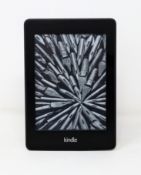 A pre-owned Kindle Paperwhite in Black.