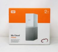 A boxed as new Western Digital 2TB My Cloud Home storage drive in white/silver.