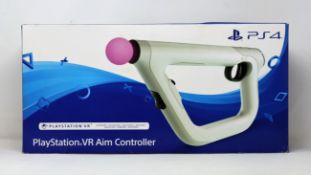 Two boxed as new Sony VR Aim controllers for PlayStation4 in white.