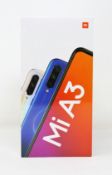 A boxed as new Xiaomi Mi A3 4GB/64GB in Kind of Grey (Box sealed. Two pin plug).