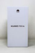 A boxed as new Huawei P30 Lite MAR-LX1A 4GB RAM 128GB ROM in Midnight Black (Box sealed. Two pin