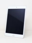 A pre-owned Apple iPad mini 4 (A1538, Wi-Fi Only) 128GB in Silver (iCloud Activation clear. Some