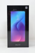 A boxed as new Xiaomi Mi 9T 6GB 64GB Smartphone in Carbon Black (Box sealed. 2-pin plug included).