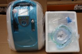 An as new Geni-Store portable car oxygen concentrator (RRP £1000) (Requires UK plug adaptor).