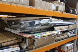 A large quantity of miscellaneous art prints, frames and related items.