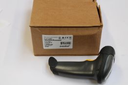 Twelve LS2208 Input/Output Scanners with stands.