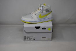 A pair of women's as new Nike Air Jordan 1 Mid SE with authentication tag (UK 4).