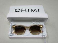 A pair of as new Chimi 02 Ecru sunglasses.