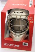 A boxed as new CCM Axis 1.5 senior goalie mask.
