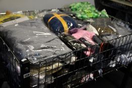 A quantity of assorted as new clothing and related items.