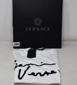 An as new Versace Signature T-shirt (M).