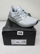A pair of as new Adidas Ultra4D (UK 6.5).