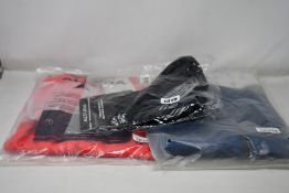 Four items of as new Altura cycling wear; Airstream long sleeve jersey (L), Nightvision Storm jacket