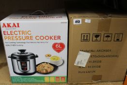 Four new AKAI Electric 6L steam, bake, saute, stew pressure cookers (AKCK601).