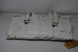 Three girls as new Ralph Lauren paint splattered denim dungarees (Ages 12, 14, 16).