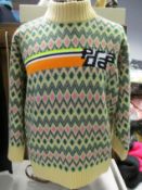 A pre-owned Prada sweater (Size 42 - Excellent condition).