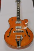 A Harley Benton BigTone Trem Vintage Orange.