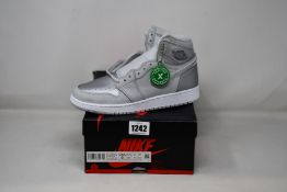A pair of as new Nike Air Jordan 1 Retro High OG GS with authentication tag (UK 5.5).