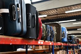 A quantity of pre-owned empty suitcases/holdalls etc.