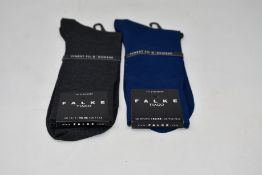 A quantity of as new Falke Tiago socks (24 pairs- RRP £16 each).