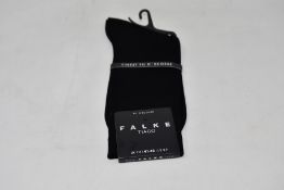 A quantity of as new Falke Tiago socks (24 pairs- RRP £16 each).