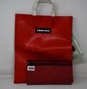 An as new Freitag F52 Miami Vice shopping bag (RRP £98) and a F271 Masikura pouch bag (RRP £80).