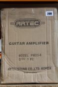 An Artec PMD3-8 Guitar Amp.