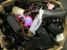 A box of branded/unbranded sunglasses and prescription glasses (Approximately 180 items).
