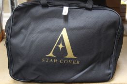 An Audi RS4 Avant Berlin black outdoor car cover.