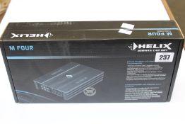 A boxed as new Helix M Four 4-channel amplifier with integrated active crossover.