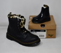 A pair of youths as new Dr Martens 1460 Serena boots (UK 4) and a pair of toddlers DM 2976 (UK 3K).