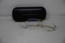 A pair of as new Victoria Beckham glasses frames.