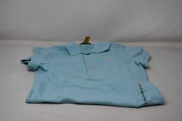 Three girls as new Ralph Lauren polo dresses (Sizes 7, 12-14, 16).