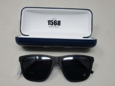 A pair of as new Lacoste sunglasses.