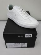 A pair of as new Hugo Boss sneakers (UK 9).