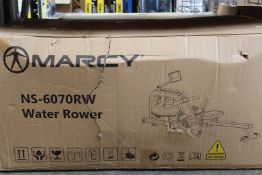 A boxed as new Marcy water rower exercise machine (NS-6070RW, box has some damage).