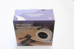 Twelve star projector night lights with alarm clock.