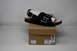 A pair of SA.P.C.Ai (A.P.C. x Sacai) sandals (EU 42 - RRP £350).