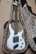 A Dingwall ABZ 4 String Bass Guitar in trans white with gig bag.