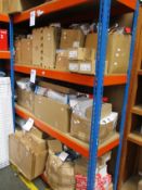 A large quantity of miscellaneous items, mainly electrical and plumbing related (3 shelves).