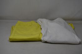 A pair of women's as new Berna trousers in yellow (TG 44) together with a Liviana Conti top (M).