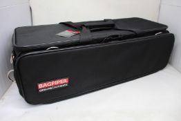Four as new Bagpiper Authentic semi-rigid pipe cases in Black.