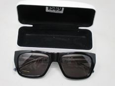 A pair of as new Calvin Klein sunglasses.